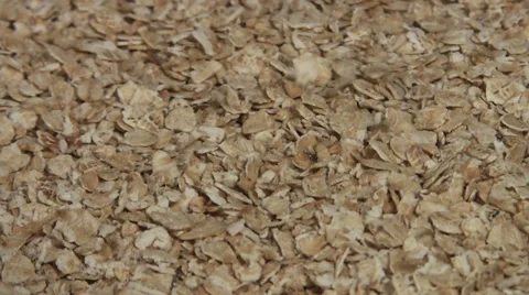 Oatmeal puring close up rotating Stock Footage 33716904