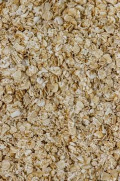 Oatmeal, rolled oats health food background texture Stock Photos