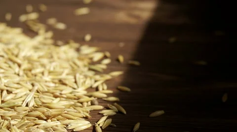 Oats on the wooden background, side view Stock Footage 61845375