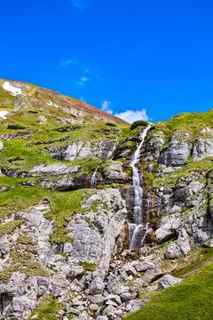 Obarsia Ialomitei waterfall in the Bucegi mountains in Romania Stock Photos