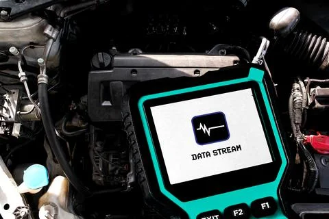 An OBD2 diagnostic scanner screen displaying data stream Stock Photos
