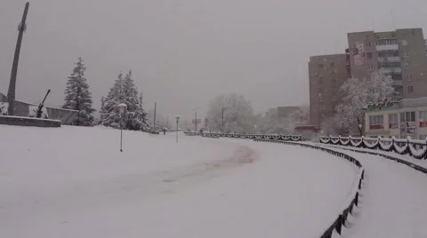 Obelisk of Glory in during the harsh winter, the snow-covered road rides minibus Stock Footage 46355440