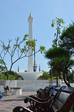 Obelisk monument side view with park bench Madiun Indonesia June 15 2025 ed.. Photos