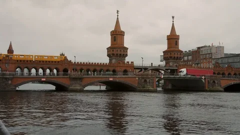 Oberbaum bridge across the Spree river in Berlin Stock Footage 79537773