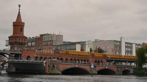 Oberbaum bridge across the Spree river in Berlin Stock Footage 79537938