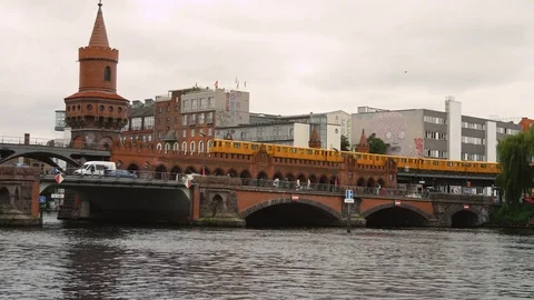 Oberbaum bridge across the Spree river in Berlin Stock Footage 79537948