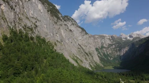 Obersee Basin Steep Cliffs and Lake Aerial Berchtesgaden Germany 動画素材 336405781