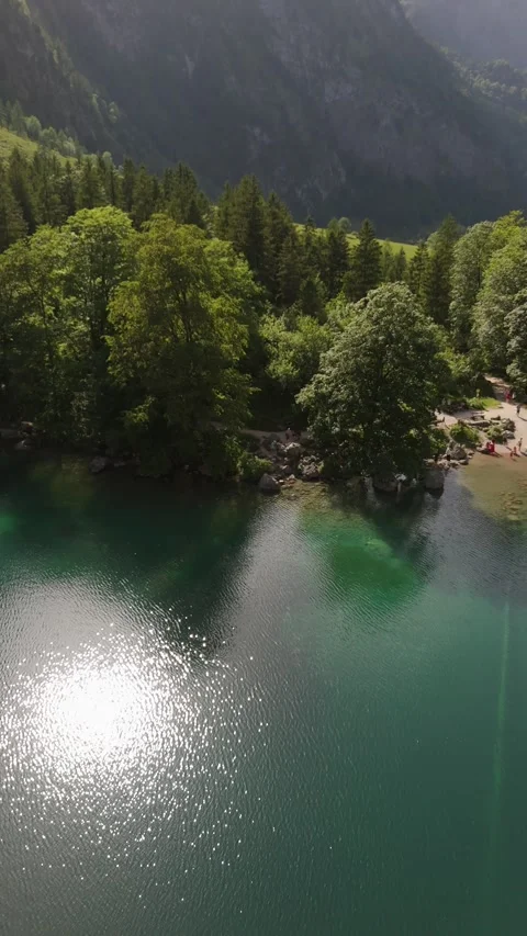 Obersee Lake Sun Reflection Vertical Aerial Berchtesgaden Germany 動画素材 336406629