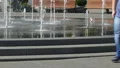 Obese man and lady walking together in city holding hands, romantic outdoor date HD Footage