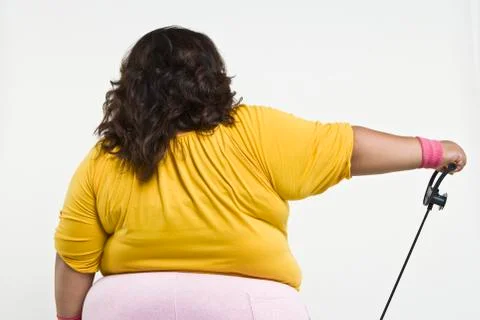 An Obese Woman Exercising Stock Photos