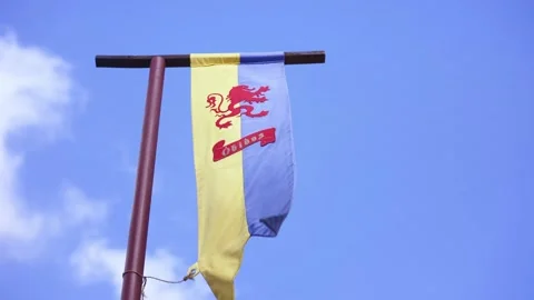 Obidos flag inside Castle of Obidos, famous medieval castle in Portugal. Summer  Stock Footage 224926657
