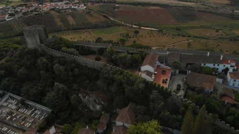 Obidos medieval portugal town inside fortress wall, panoramic aerial view Stock Footage