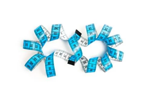 A object about Sewing measuring tape with eternity shape on a isolated white Stock Photos
