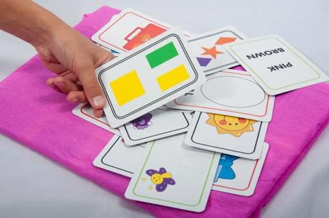Object cards in hand Stock Photos