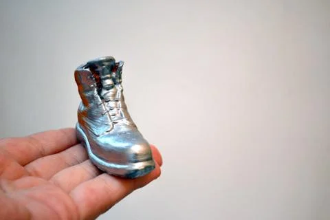 Object in the form of a boot printed on a 3d printer and covered with enamel Stock Photos