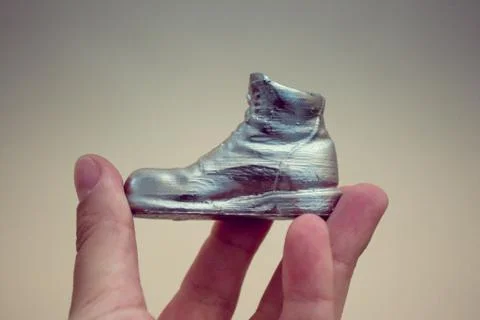 Object in the form of a boot printed on a 3d printer and covered with enamel Stock Photos