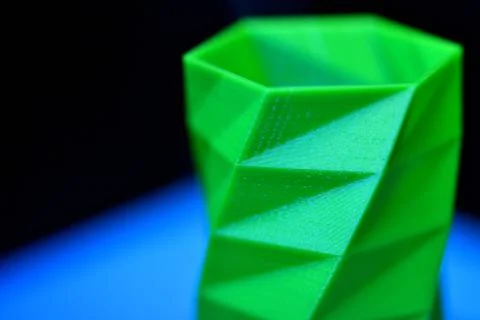 The object printed 3D printer on a blue and black background Foto stock