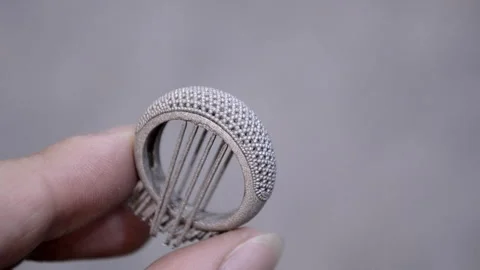 Object printed on 3D printer from metal powder by laser sintering Stock Footage 328700992