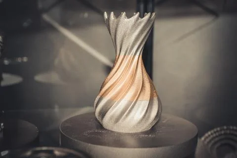 Object printed on metal 3d printer close-up. Stock Illustration