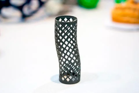 Object printed on metal 3d printer isolated on white background close-up. Stock Photos