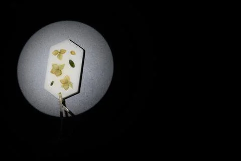 Object shooting. Flat lay Florentine Sachet with Yellow Dried Flowers. Stock Photos
