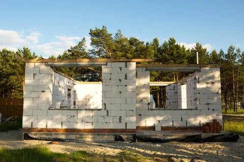 The object of unfinished construction is a future house made of a porous conc Stock-Fotos