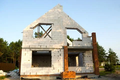 The object of unfinished construction is a future house made of a porous conc Stock Photos