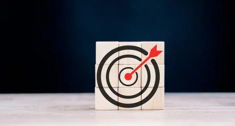 Objective and target concept. Arrow upward to target on wooden cubes. Stock Photos