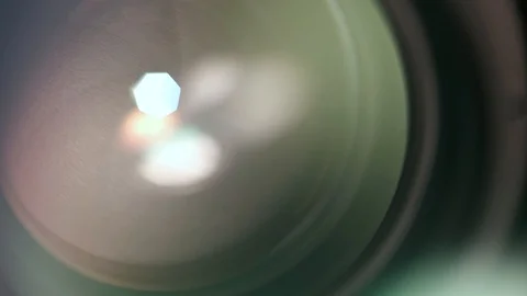 Objective lens reflections Stock Footage 128450606