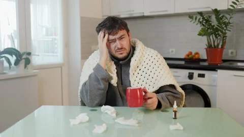 Objective Portrait Bearded Man in Duvet Faces Headache at Home Stock Footage 280386232