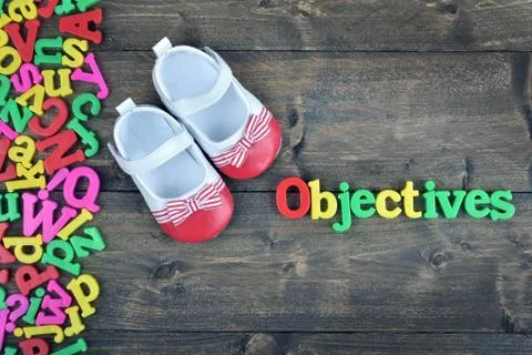 Objectives on wooden table Stock Photos