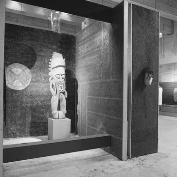 Objects between three panels; Exhibition Papua art in the Rijksmuseum. . C... Stock Photos