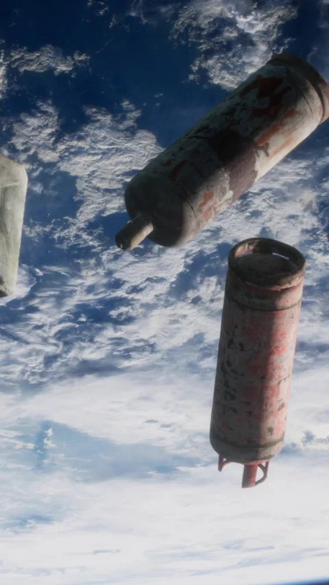 Objects floating in space above the Earth with the atmosphere below Stock Footage 344959500