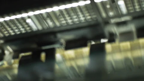 Objects fly by on a printing press Stock Footage 130144312
