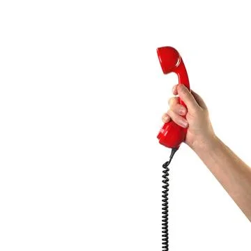 Objects Hands action - Hand holds retro phone red handset. Isolated Stock Photos