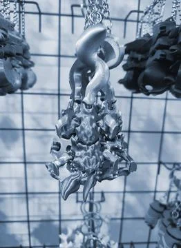 Objects keychains in form different models of toys printed 3D printer Blue color Stock Photos