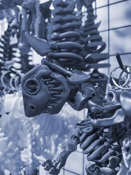Objects keychains form fish skeleton, models toys printed 3D printer Blue color Stock Photos