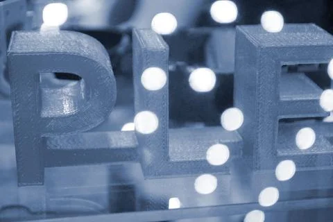 Objects letters printed on 3D printer close-up Models 3D printed molten plastic Foto stock