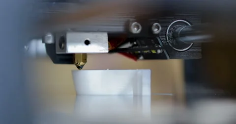 Objects printed by 3d printer. Automatic three dimensional 3d printer Stock Footage 149482181