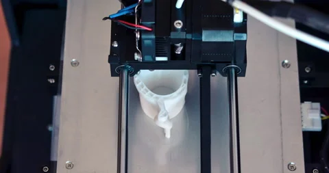 Objects printed by 3d printer. Automatic three dimensional Stock Footage 150000871