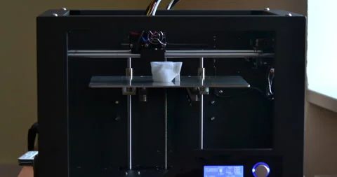 Objects printed by 3d printer. Automatic three dimensional 3d printer Stock Footage 150001599