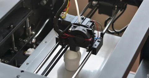 Objects printed by 3d printer. Automatic three dimensional 3d printer Stock Footage 150002777