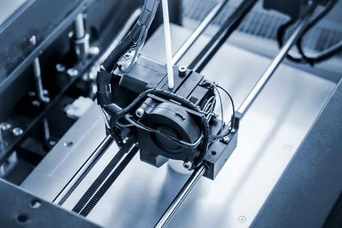 Objects printed by 3d printer. Automatic three dimensional 3d printer performs Foto stock