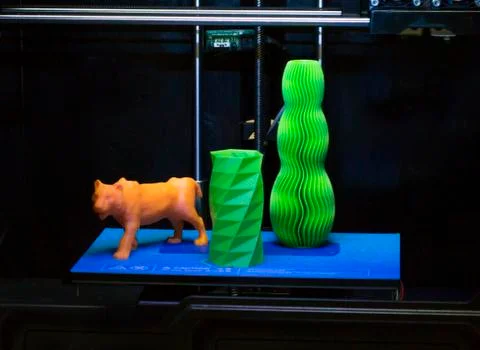 The objects printed 3D printer on a blue and black background Foto stock