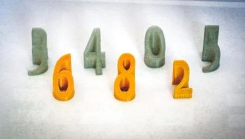 Objects printed by 3d printer Isolated on white background. Stock Photos