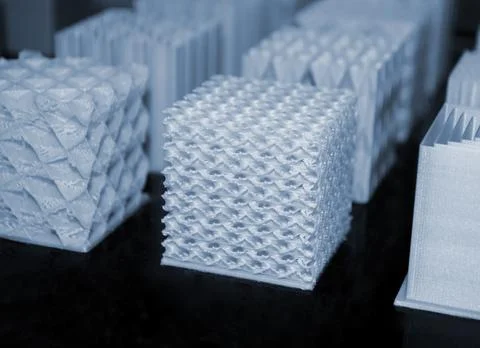 Objects printed on a 3d printer made of white plastic close-up. Stock Photos