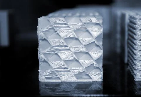 Objects printed on a 3d printer made of white plastic close-up. Stock Photos