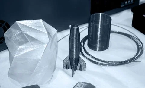 Objects printed on 3D printer from plastic close-up. New 3D printing technology. Stock Photos