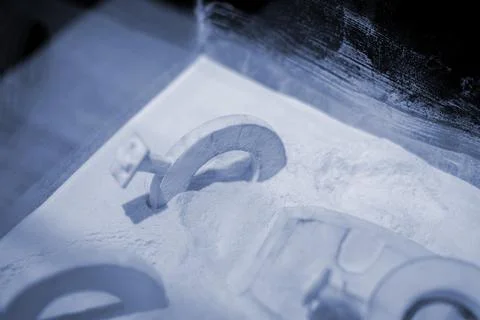 Objects printed 3D printer from powdered polyamide lying white polyamide powder Stock Photos