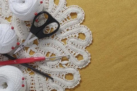 Objects for sewing. Scissors and pins. Hanks thread on mat. Pins Stock Photos